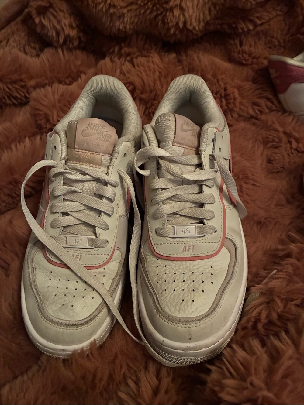 Nike Women’s White Sneakers with Light Pink Trim